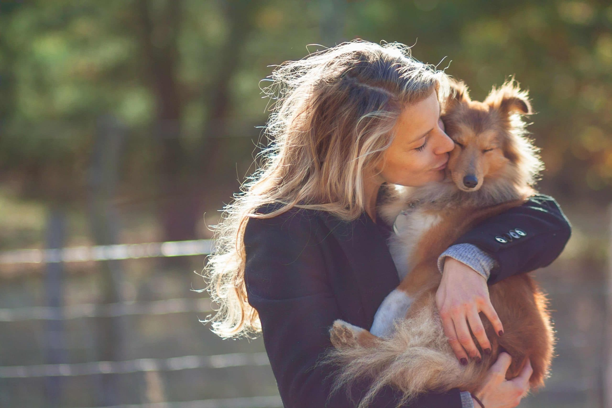 Woman holding dog